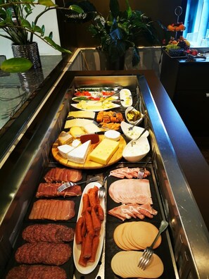 Daily buffet breakfast (EUR 15 per person)