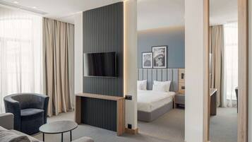 Suite, 1 slaapkamer | Een kluis op de kamer, geluiddichte muren, gratis wifi, beddengoed