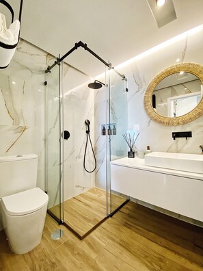 Shower, hair dryer, towels, soap