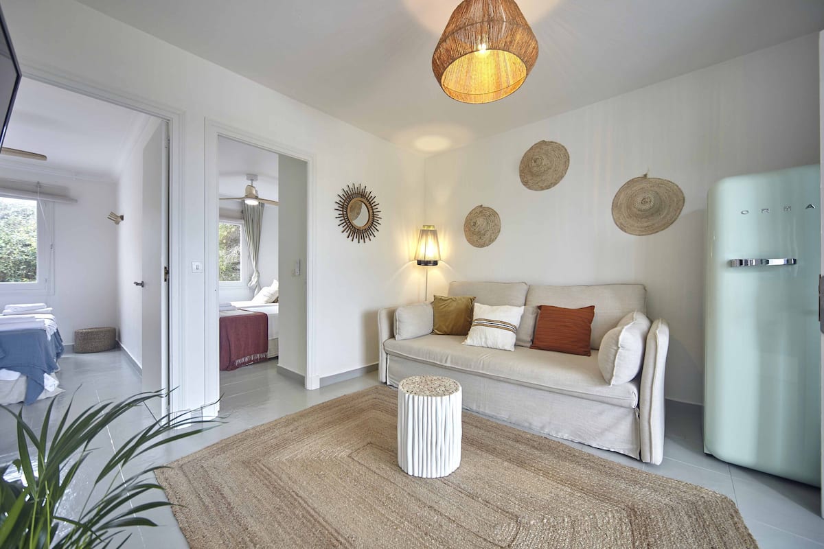 Superior Apartment, Sea View | Living area | TV