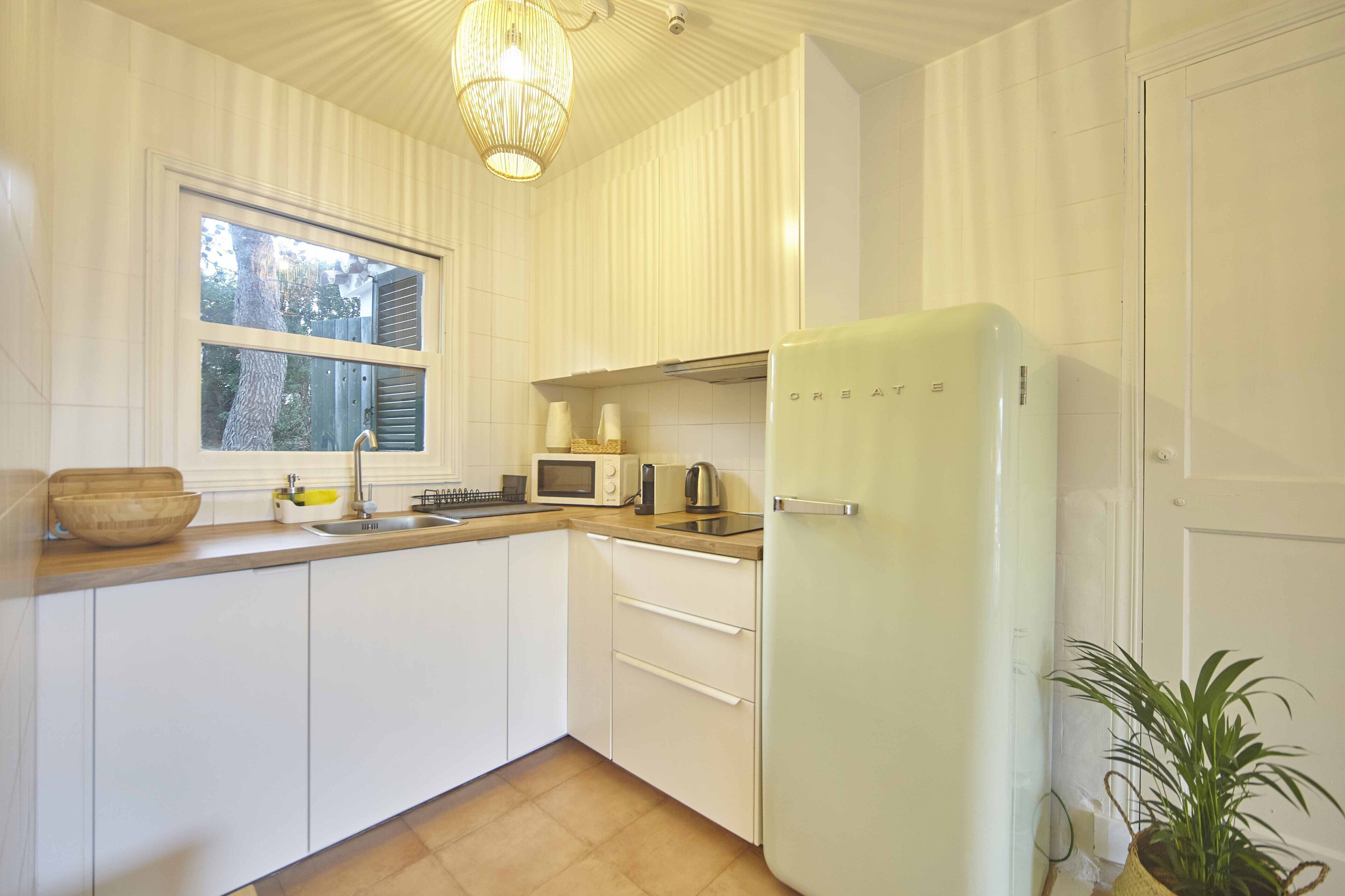 superior apartment | private kitchen | full-sized fridge, microwave, dishwasher, cookware/dishes/utensils