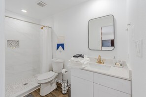 Hair dryer, towels, soap, shampoo