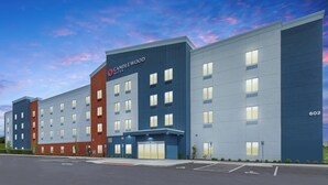 A multi-story hotel with a modern design, featuring a prominent "CANDLEWOOD SUITES" sign. - Candlewood Suites Erlanger South Cincinnati by IHG (Erlanger)