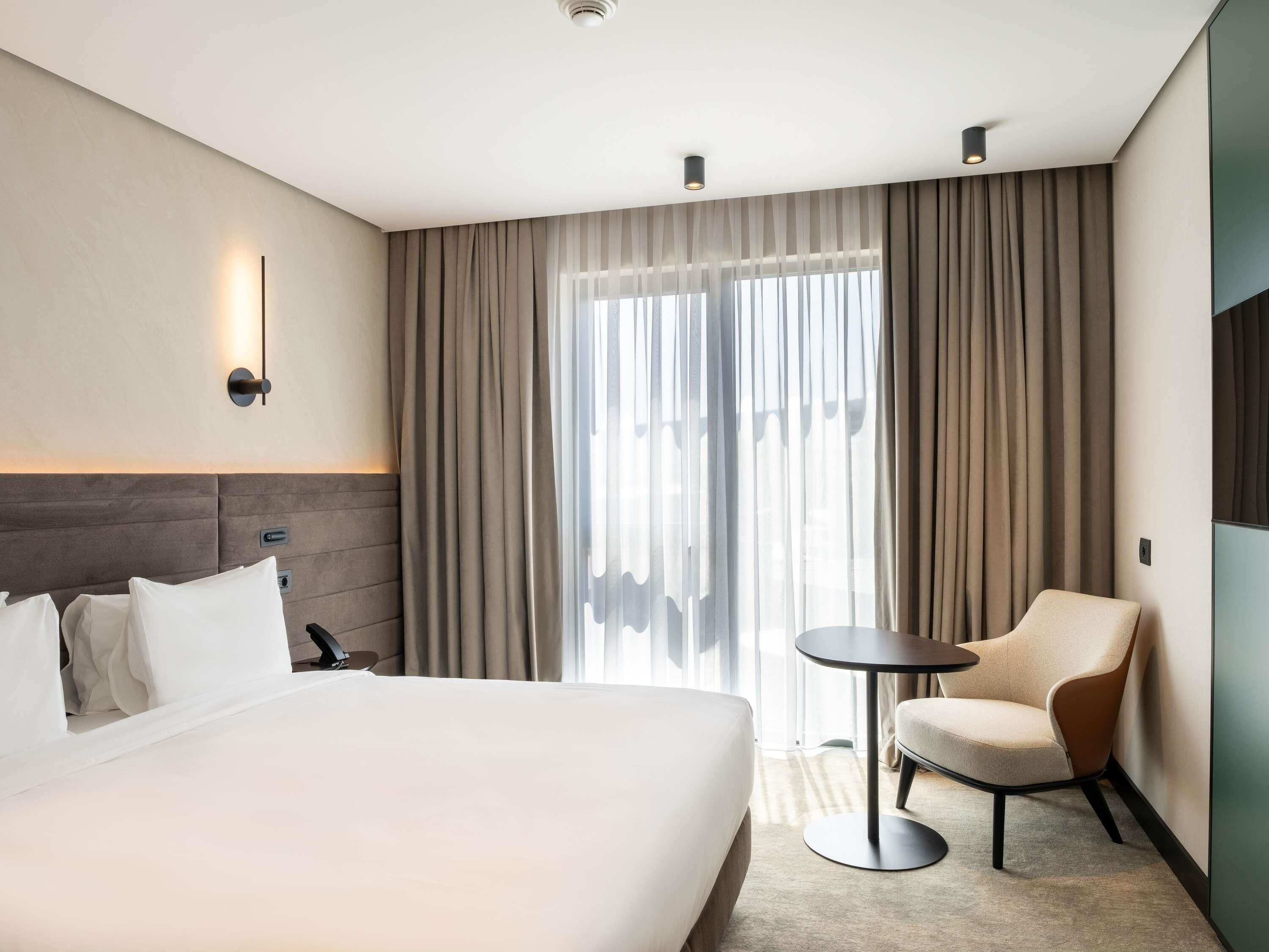 Chambre Exécutive, 1 très grand lit