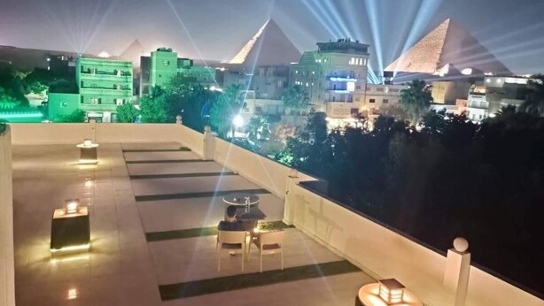 Unclassified image, 1 of 63, button - Nefertiti pyramids view - (Giza)