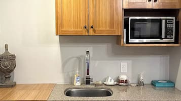 Fridge, microwave, coffee/tea maker, electric kettle