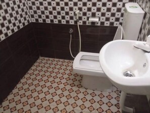 Bidet, towels, soap, shampoo