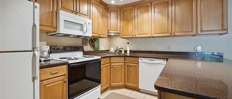 Fridge, microwave, coffee/tea maker, toaster