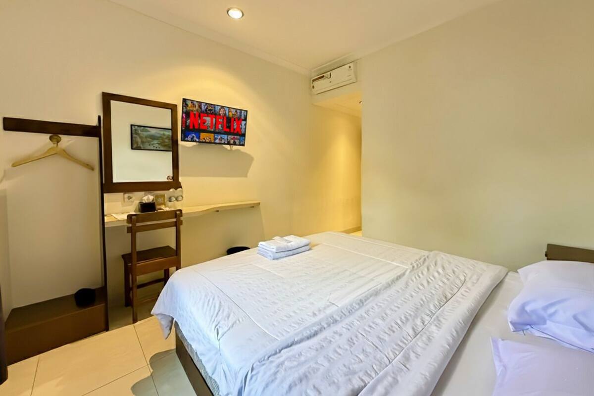 Quarto casal superior | Escrivaninha, Wi-Fi de cortesia, roupa de cama