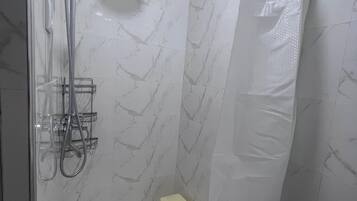 Hair dryer, towels, soap, shampoo