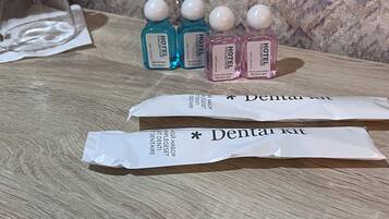 Hair dryer, towels, soap, shampoo