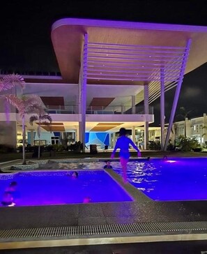 Community swimming pool (night time)