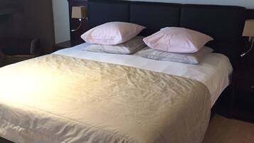 Family Quadruple Room | 1 bedroom, in-room safe, desk, laptop workspace