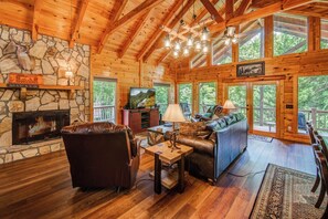 Cabin, 1 King Bed with Sofa bed, Patio | Living area | 40-inch TV with cable channels, fireplace - Treetop Oasis Retreat (Ellijay)
