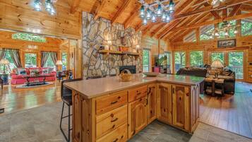 Cabin, 1 King Bed with Sofa bed, Patio | Private kitchen | Fridge, microwave, oven, stovetop