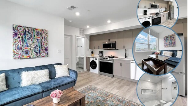 A modern apartment with a living room, kitchen, and bathroom.
