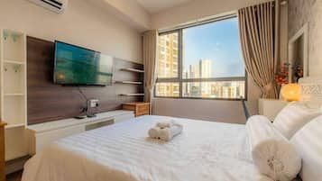 2 habitaciones, tabla de planchar con plancha y cuna de viaje