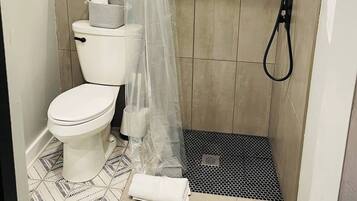 Hair dryer, towels, soap, shampoo