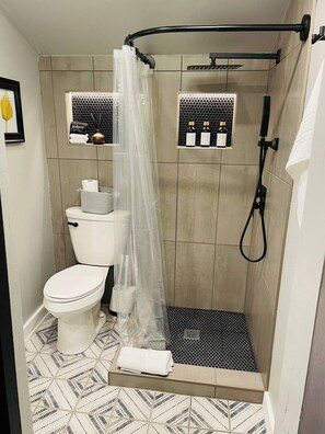 Hair dryer, towels, soap, shampoo