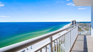 A balcony with a view of the ocean and beach. - Palacio 1702 | Beachfront, Resort Amenities | My Beach Getaways (Pensacola)