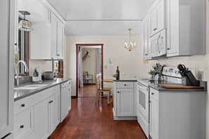 Fridge, microwave, oven, stovetop - RMR: Lake Creek Cottage Home in The Aspens (Wilson)