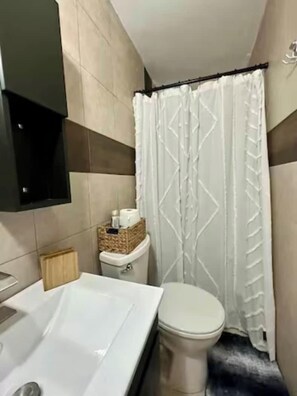 Hair dryer, towels, soap, shampoo