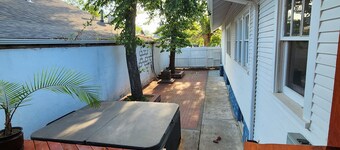 Spacious home in downtown Scottsbluff with hot tub and large backyard deck. 