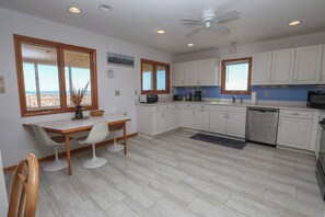 Fridge, microwave, oven, stovetop - Baugh Cottage - Wake up to oceanfront views in this Southern Shores home! (Southern Shores)
