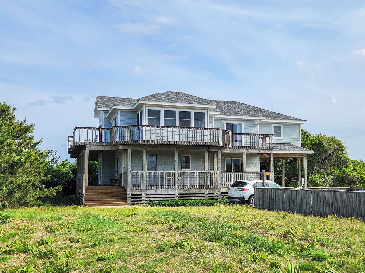 Take in the serenity of quiet OBX living with this beautiful oceanside home w/Private Pool!