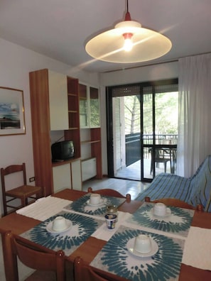 Apartment, 1 Bedroom, Balcony, Garden View | Dining room - Flat in Residence With Swimming Pool and Balcony (San Michele al Tagliamento)