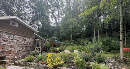 Getaway on famous Spring Creek, minutes from Beaver Stadium and State College.