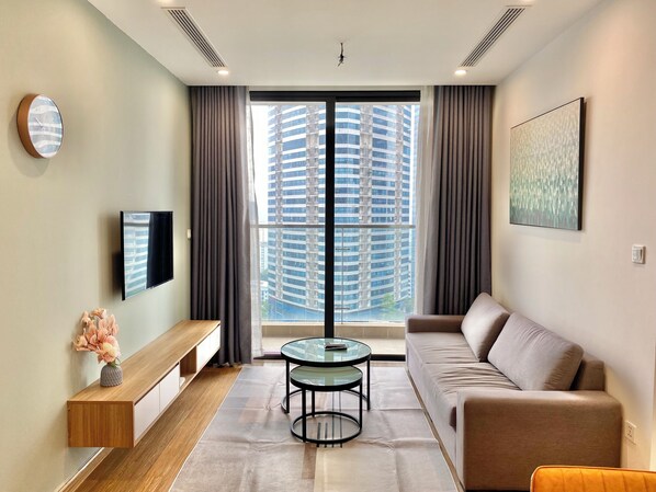 Luxury Apartment | Living area | 45-inch Smart TV with digital channels, Netflix, pay movies