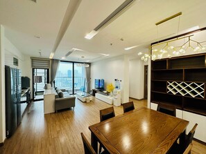 Familienapartment | Wohnbereich | Flachbildfernseher