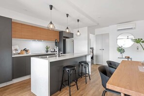 Fridge, microwave, oven, stovetop - Stylish & Superb! 2Bed/2Bath/1Car~ Walk to CBD (Spring Hill)