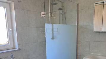 Shower, free toiletries, hair dryer, towels
