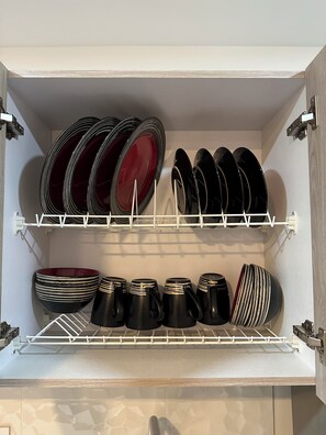 Microwave, coffee/tea maker, cookware/dishes/utensils, ice maker