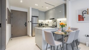 Comfort Apartment | Dining room - Jaw-Dropping Canal Views From This Stylish Condo (Dubai)