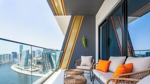 Comfort Apartment | Balcony - Jaw-Dropping Canal Views From This Stylish Condo (Dubai)