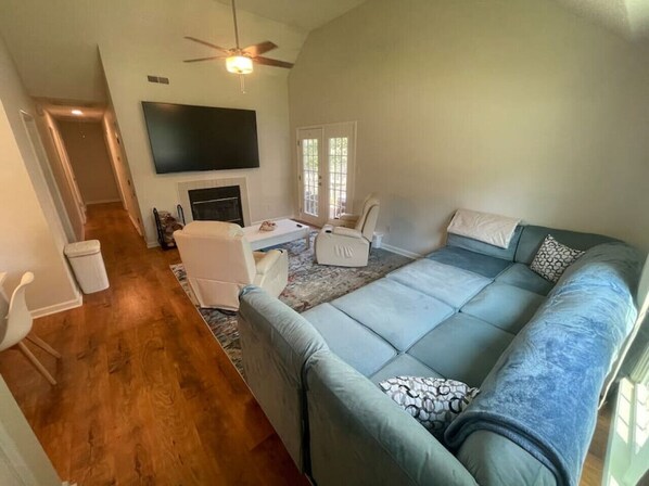 TV, fireplace - 🌟🌟No Stairs, 86” TVs, King Beds & Massage Near UGA🌟🌟 (Athens)