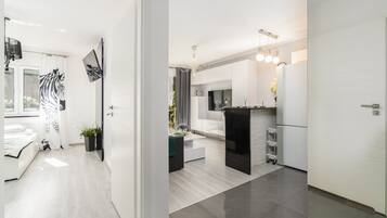 Microwave, dishwasher, high chair, cookware/dishes/utensils