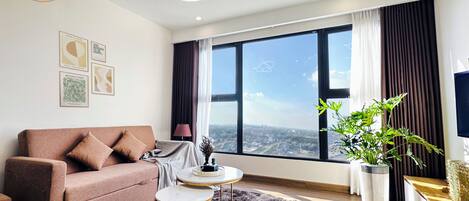 Panoramic Studio Suite | Living room | 45-inch Smart TV with digital channels, Netflix, streaming services