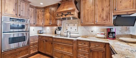 Microwave, stovetop, dishwasher, coffee/tea maker