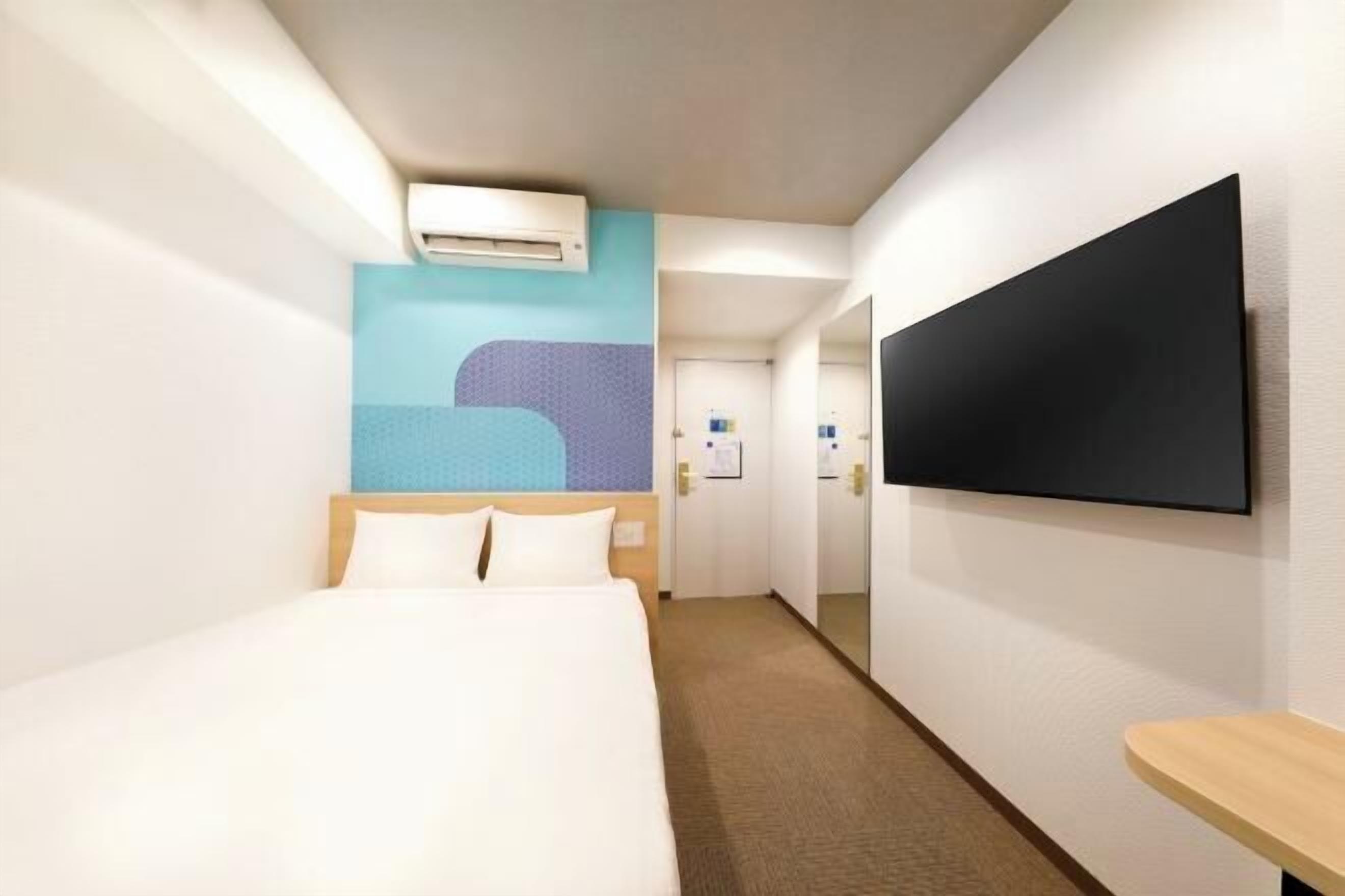 Desk, laptop workspace, free WiFi, bed sheets