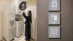 A person operating an ice machine in a hotel room. -  HOP INN Tokyo Iidabashi (Tokyo)
