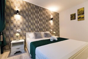 1 chambre, fer et planche à repasser, Wi-Fi gratuit, draps fournis