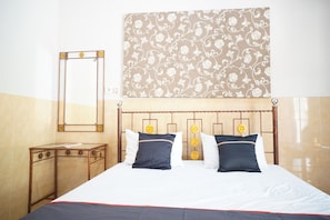 Desk, laptop workspace, bed sheets