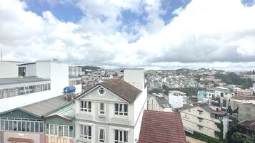 Deluxe Quadruple Room | 1 bedroom, minibar, desk, laptop workspace