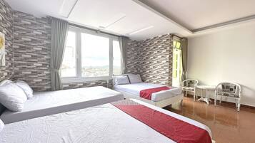 Family Room, Multiple Beds | 1 bedroom, minibar, desk, laptop workspace