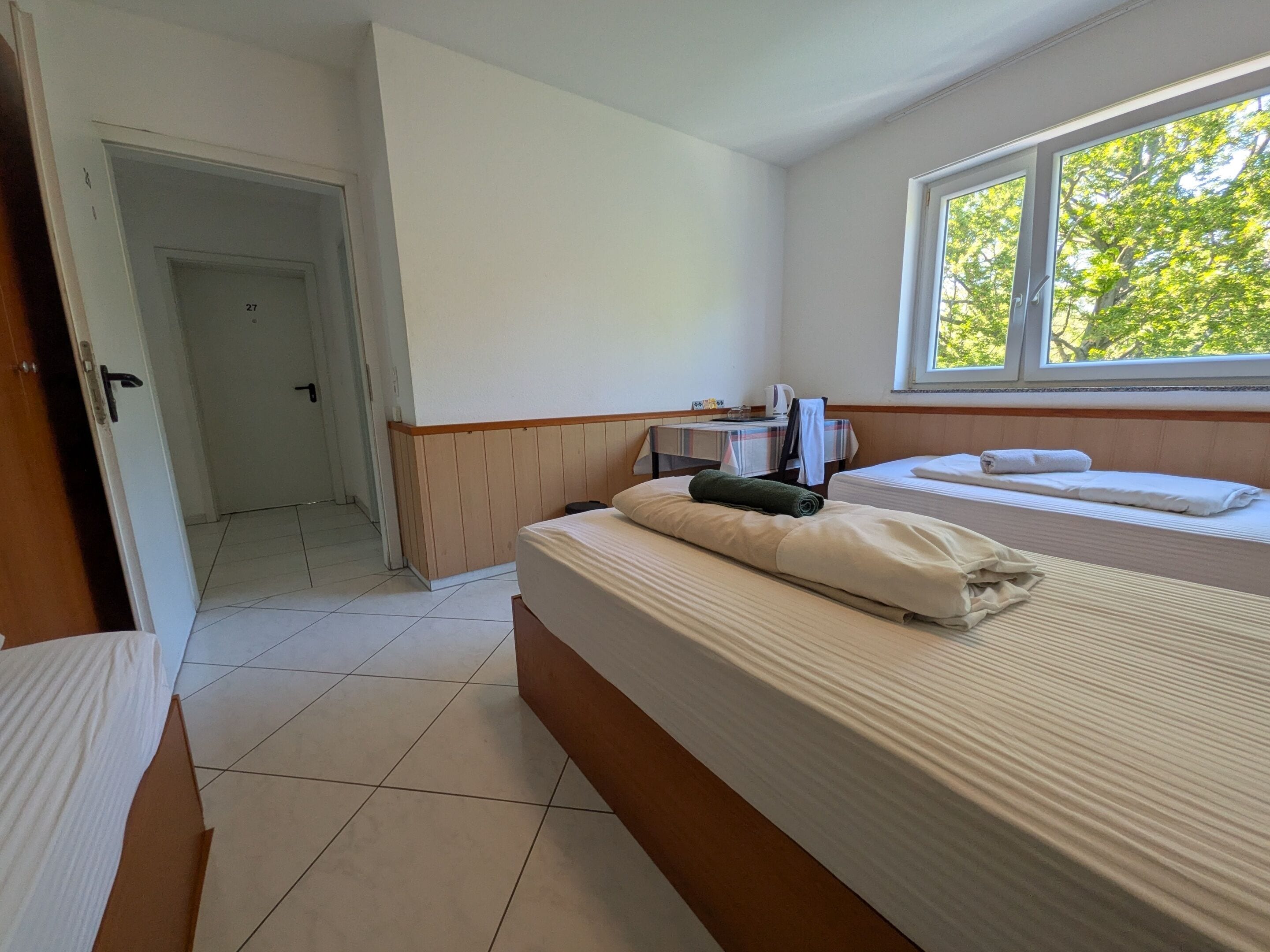 Habitación triple, baño compartido | Wifi gratis y ropa de cama 