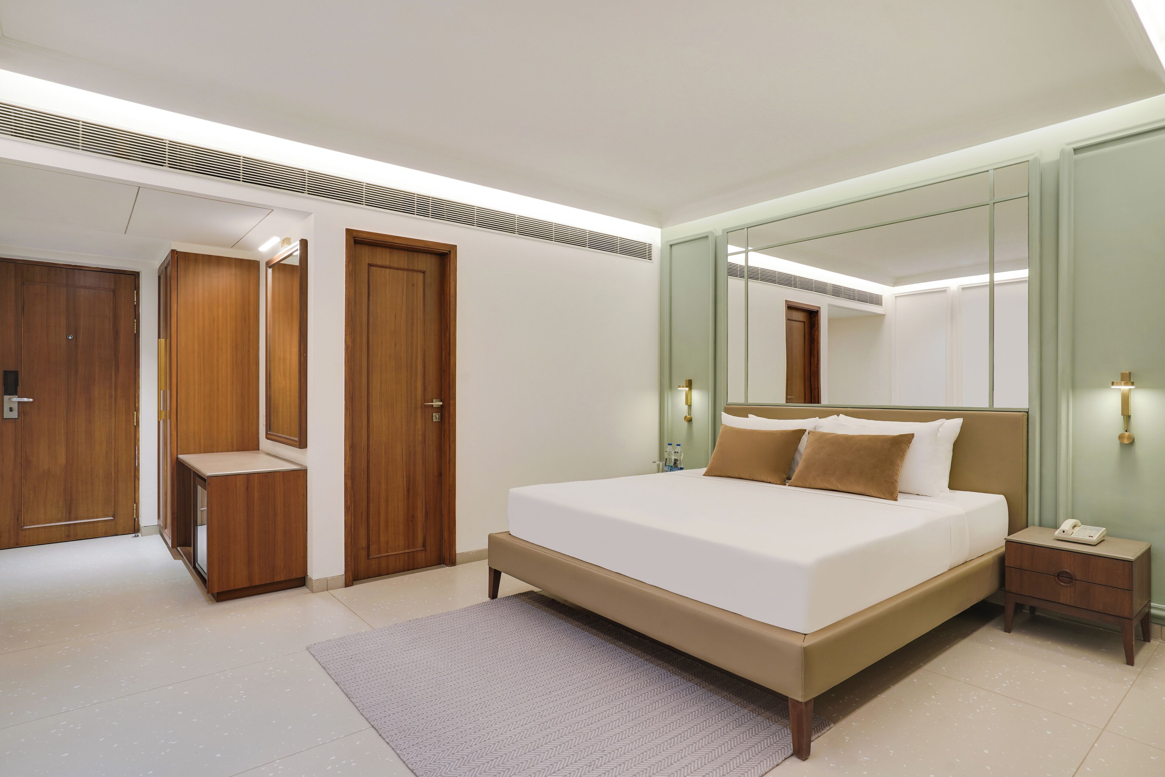 Habitación ejecutiva | Minibar, tabla de planchar con plancha, wifi gratis y ropa de cama